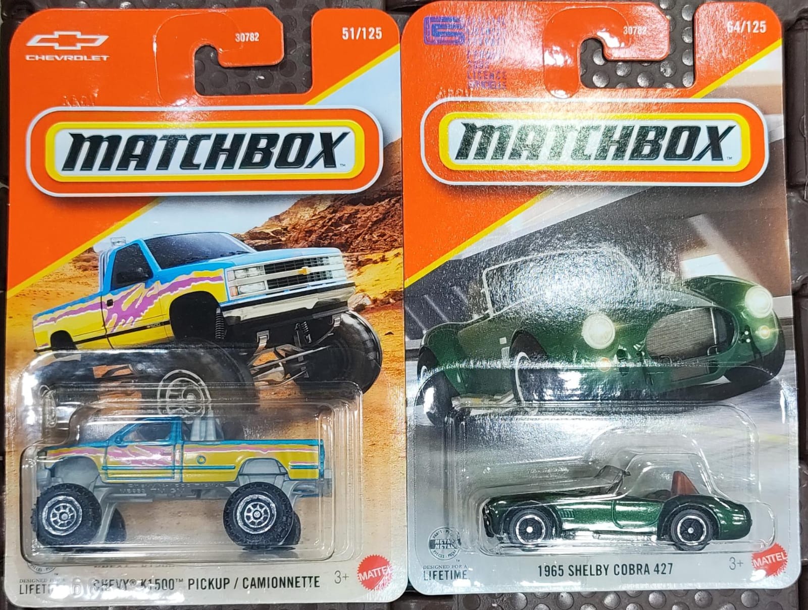 Matchbox Cars 2026 - Combo Pack of 2 Pcs - 1965 Shelby Cobra 427 & Chevy k1500 Pickup - 30782-95FG