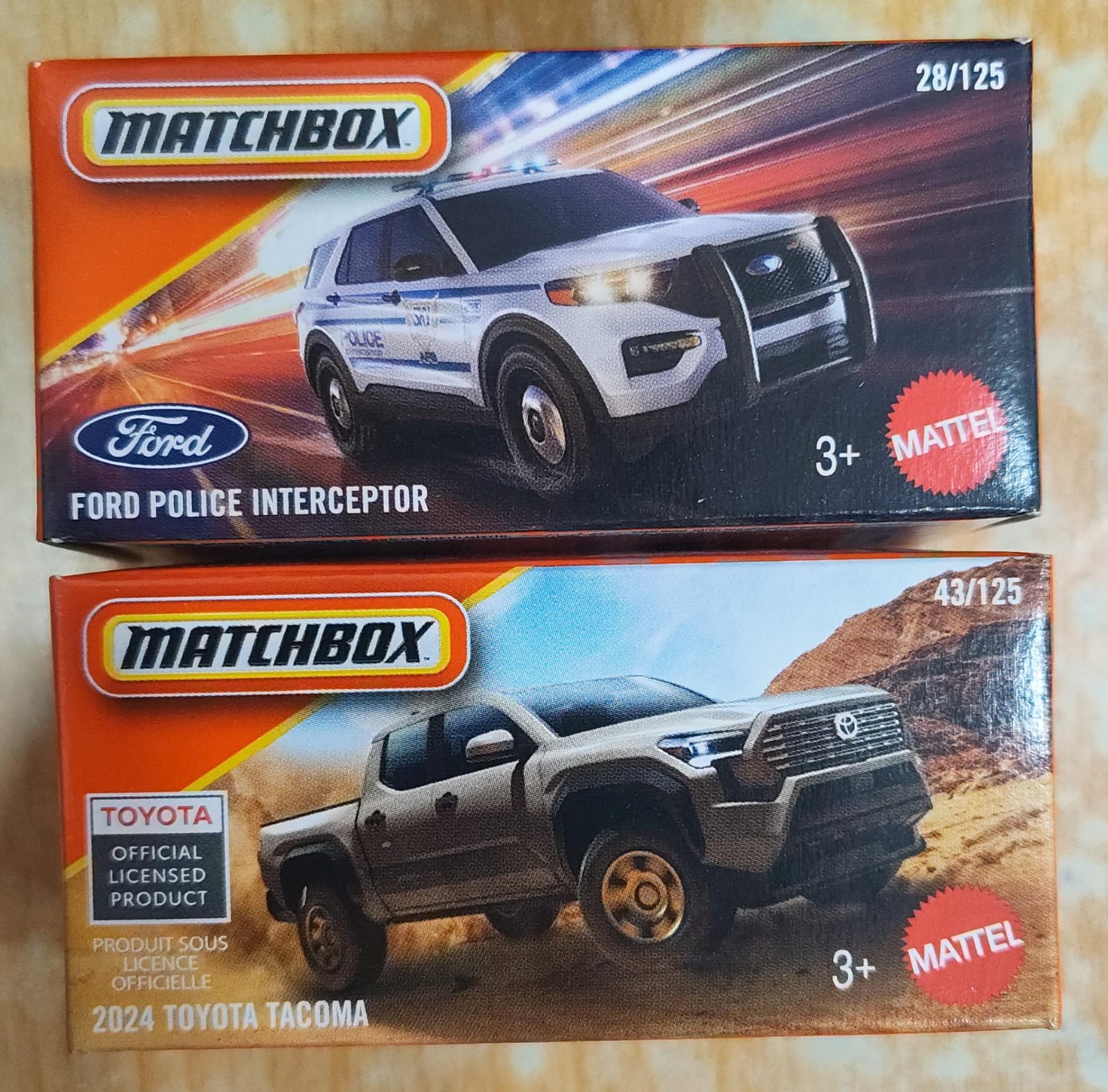 Matchbox Mainline - Combo Pack of 2 Cars - 2024 Toyota Tacoma & Ford Police Interceptor - DNK70
