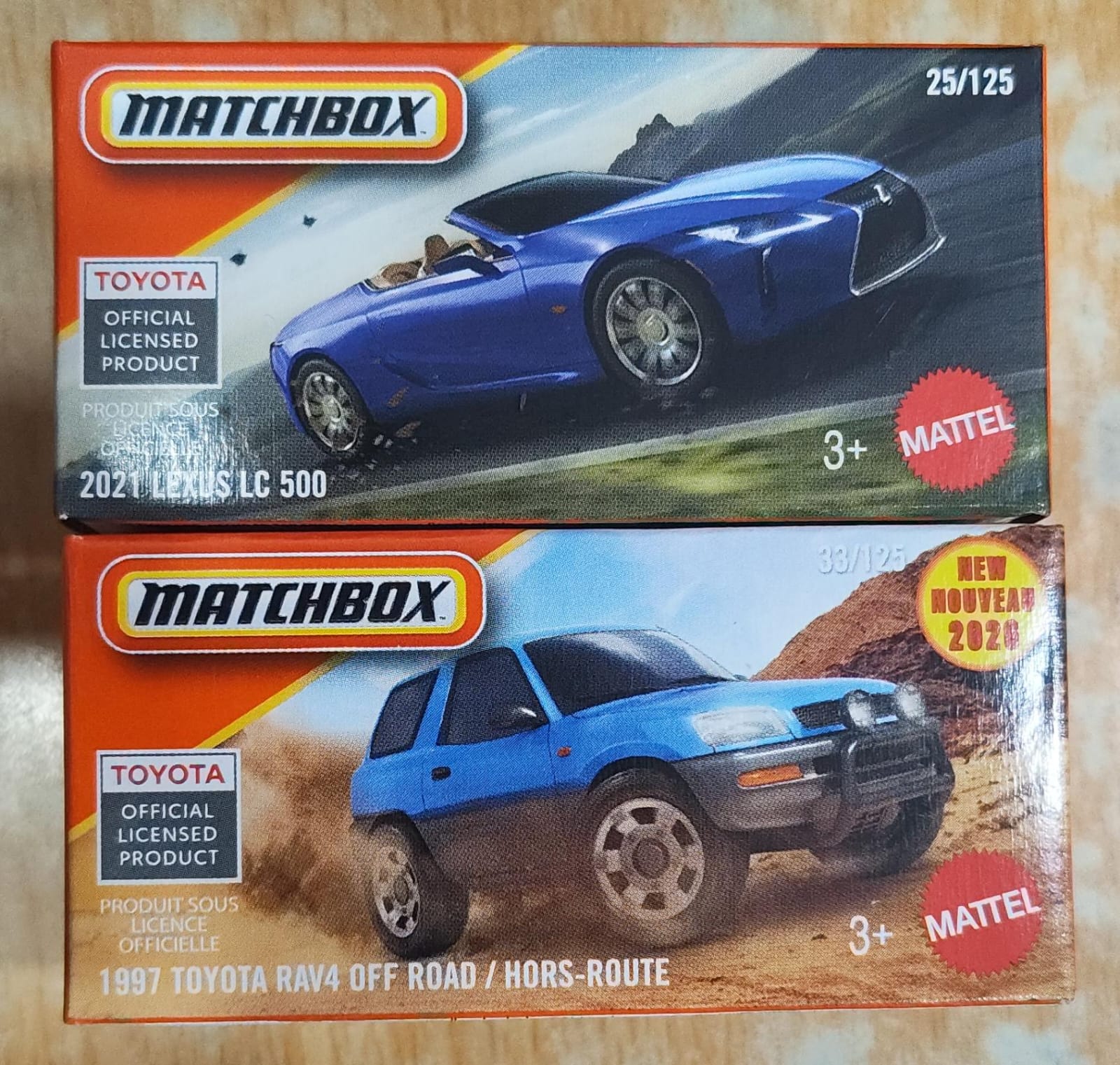 Matchbox Mainline - Combo Pack of 2 Cars - DNK70 - 1997 Toyota RAV4 Off Road / Hors Route & 2021 Lexus LC 500