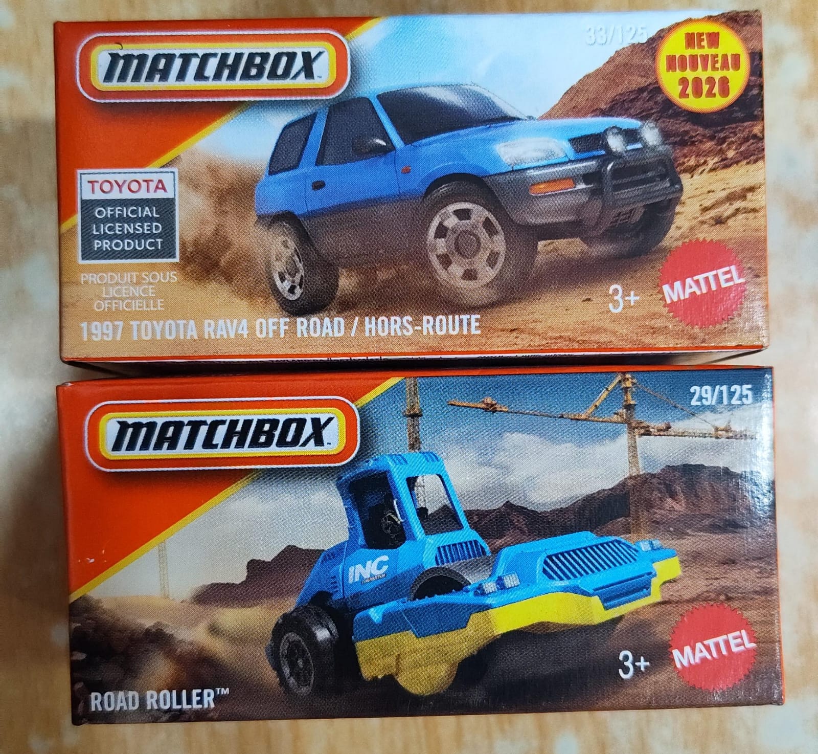 Matchbox Mainline - Combo Pack of 2 Cars - DNK70 - 1997 Toyota RAV4 Off Road / Hors Route & Road Roller