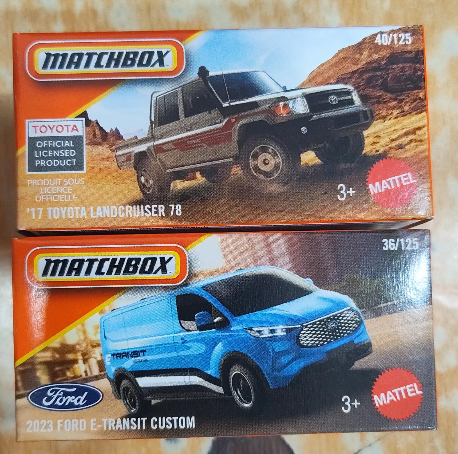 Matchbox Mainline - Combo Pack of 2 Cars - 17 Toyota Landcruiser 78 & 2023 Ford E-Transit Custom - DNK70