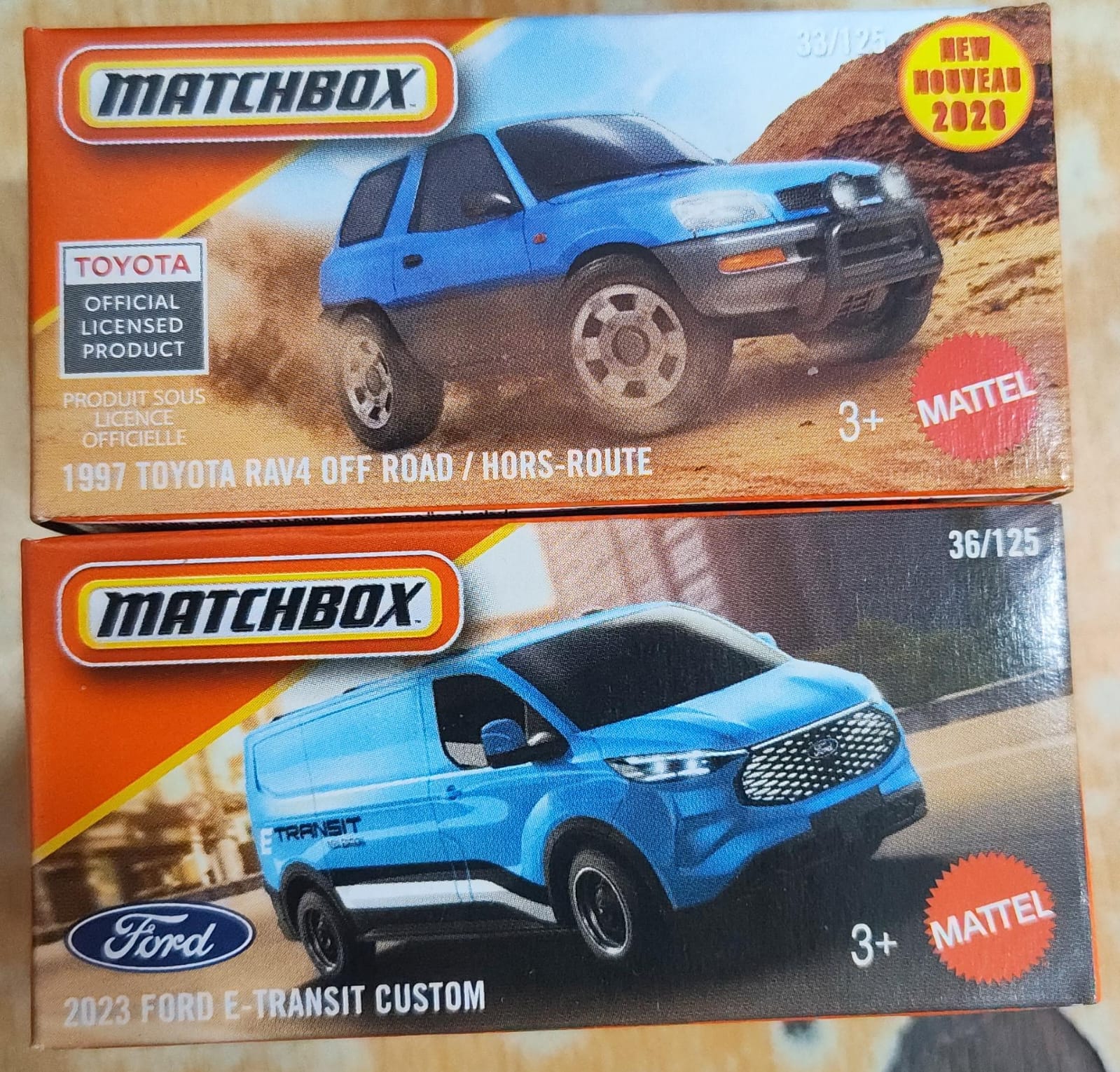 Matchbox Mainline - Combo Pack of 2 Cars - DNK70 - 1997 Toyota RAV4 Off Road / Hors Route & 2023 Ford E-Transit Custom