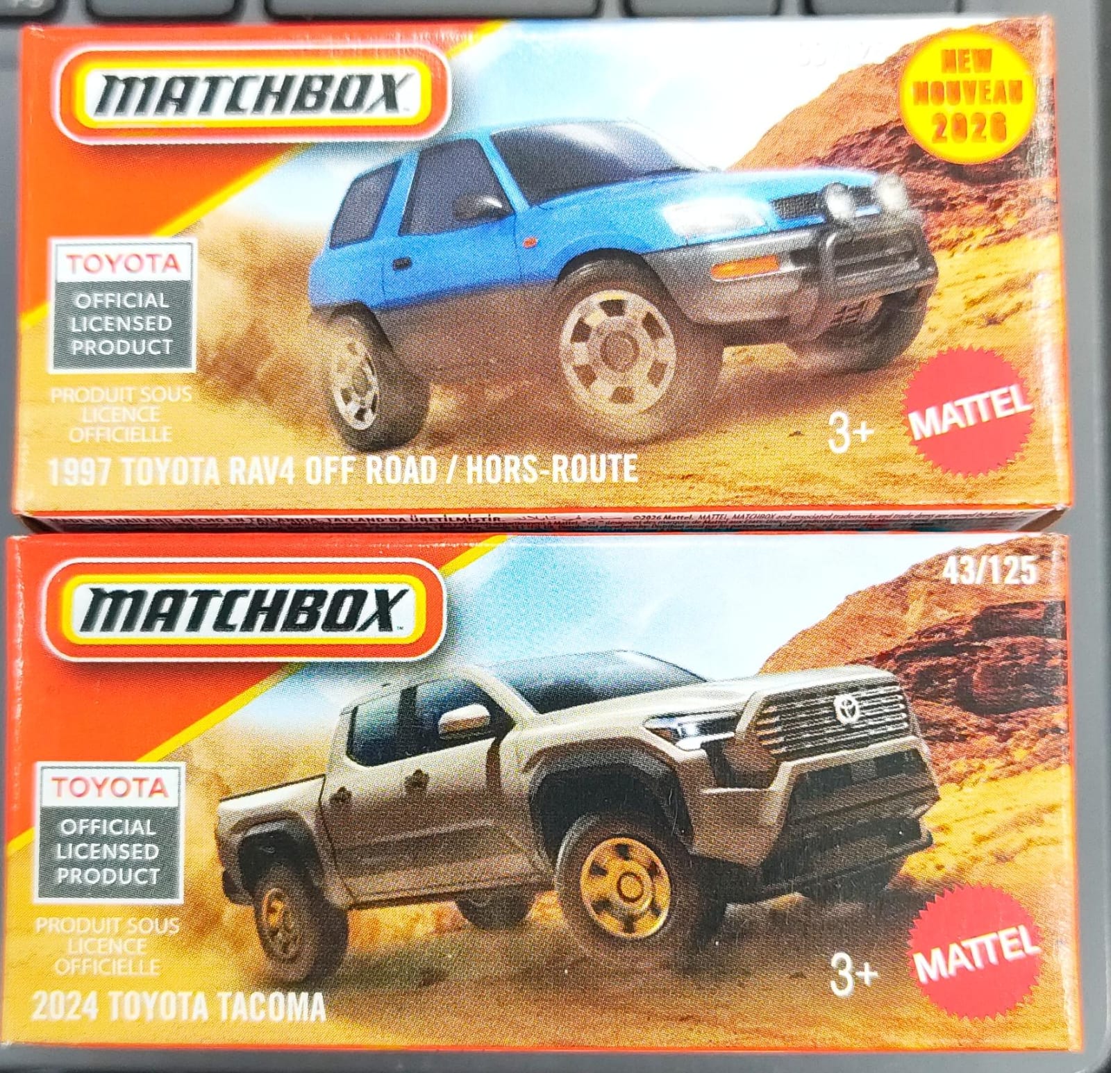 Matchbox Mainline - Combo Pack of 2 Cars - 2024 Toyota Tacoma & 1997 Toyota Rav4 Off Road/ Hors-Route - DNK70