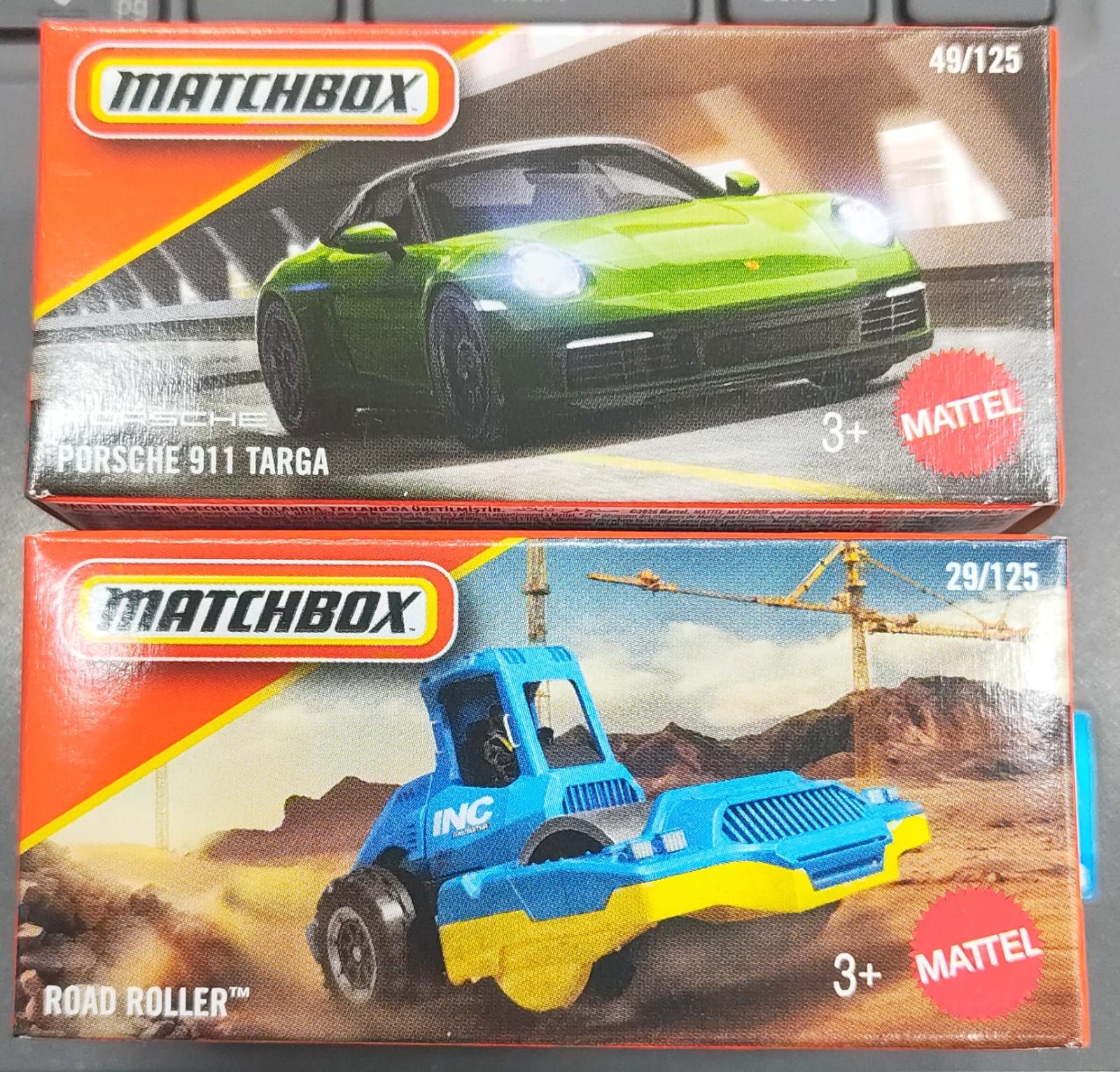 Matchbox Mainline - Combo Pack of 2 Cars - DNK70 - Porsche 911 Targa & Road Roller
