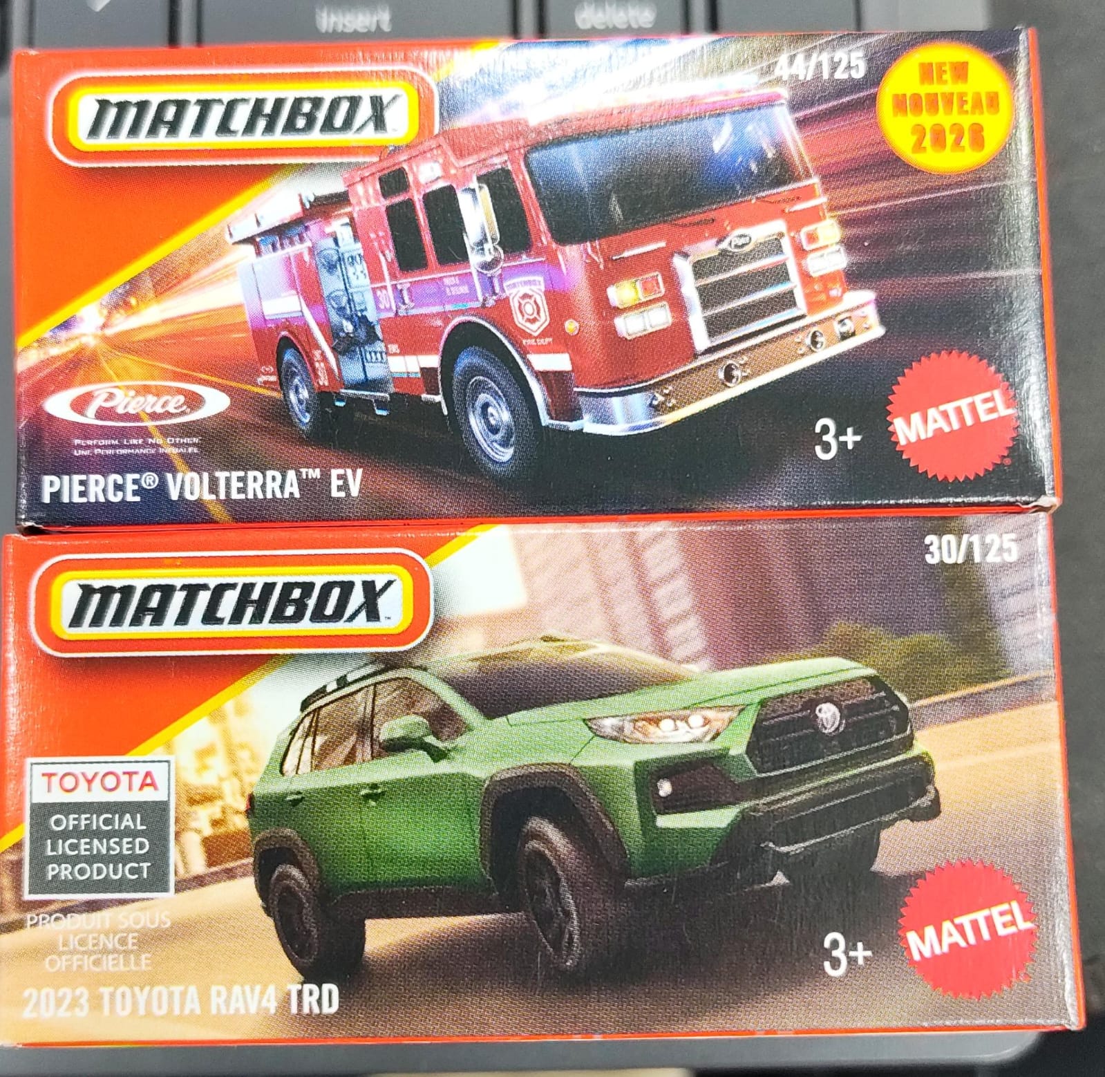Matchbox Mainline - Combo Pack of 2 Cars - DNK70 - Pierce Volterra Ev & 2023 Toyota RAV4 TRD